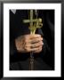 A Nun's Hands Holding Two Crosses Made Of Palm Leaves, St. Anne Church, Israel by Eitan Simanor Limited Edition Print