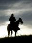 Cowboy On Horse In Silhouette On The Ridge Of A Mountain by Scott Stulberg Limited Edition Pricing Art Print