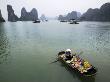 Boat Woman Selling Fruit In Halong Bay, Vietnam by Scott Stulberg Limited Edition Print