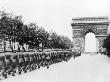 German Troops Probably Marching Up To The Arc De Triomph In Paris During World War Ii by Robert Hunt Limited Edition Print