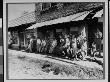 Children And Adults Lined Up In Front Of Post Office Waiting For Mail by Russell Lee Limited Edition Print