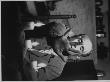 Dancer Jose Limon Seated At Candle Lit Table At His Home by Gjon Mili Limited Edition Print