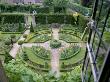 Box Circle With Topiary Shapes And Irises Seen From The Top Window Of The Abbey House, Wiltshire by Clive Nichols Limited Edition Print