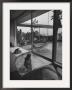 Designer Raymond Loewy Relaxing By Swimming Pool Which Runs From Outdoors Into Living Room by Peter Stackpole Limited Edition Print