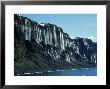 Waterfalls Cascading Down Cliffs, Vega Isle, East Side Antarctic Peninsula by Rick Price Limited Edition Print