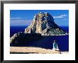 Girl On Rock Looking At Offshore Isle Of Es Vedra, Ibiza, Spain by David Tomlinson Limited Edition Print