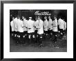 Beautillion Party, Young Men Wearing White Jackets, Bermuda Shorts And Knee Length Socks by Francis Miller Limited Edition Print