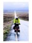 Cross-Country Cyclist On Wet Road, Monument Valley, U.S.A. by Ann Cecil Limited Edition Print