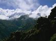 A Man Dwarfed By Massive Mountain Peaks In The Vilcabamba Range by Gordon Wiltsie Limited Edition Print