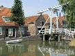 Houses On Canal, Wooden Drawbridge, Monnickendam, Noord Holland, Holland (The Netherlands) by Brigitte Bott Limited Edition Print