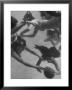 Girl Getting Her Hair Pulled As Swimmers Play A Fast Scrimmage Of Water Polo At Athletic Club by Peter Stackpole Limited Edition Print