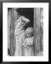 Pregnant Sharecropper's Wife Standing In Doorway Of Wooden Shack With Daughter, The Depression by Arthur Rothstein Limited Edition Pricing Art Print