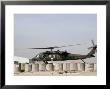 Uh-60 Blackhawk Prepares To Land At Camp Warhorse To Refuel by Stocktrek Images Limited Edition Print