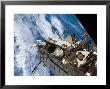 Astronaut Sts-116 Mission Specialist Participates In Extravehicular Activity by Stocktrek Images Limited Edition Print