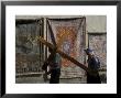 Couple Of Pilgrims Carrying A Cross On The Via Dolorosa During Good Friday Catholic Procession by Eitan Simanor Limited Edition Print