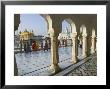 Group Of Sikh Women Pilgrims Walking Around Holy Pool, Golden Temple, Amritsar, Punjab State, India by Eitan Simanor Limited Edition Print