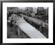 Workers On The Wing Of An Airplane In The Caproni Factory In Predappio by A. Villani Limited Edition Print