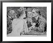 Young Man Has Trouble Concentrating On Bridge Game Because His Attention Is On A Young Woman by Charles Dana Gibson Limited Edition Pricing Art Print