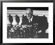 President Franklin D. Roosevelt Sitting In Front Of A Network Radio Microphones by George Skadding Limited Edition Print