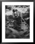 Hippie Couple Kissing At Woodstock Music Festival by Bill Eppridge Limited Edition Print