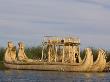 Totora Reed Boats Used By Inhabitants Of The Floating Islands, Islas De Los Uros, Lake Titicaca by Dennis Kirkland Limited Edition Print