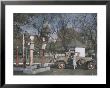 A Filling Station In The Shadow Of The United States Capitol, Photograph Dated 1929 by Edwin L. Wisherd Limited Edition Print