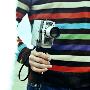 A Young Man Holding An Old Cine Camera by Jewgeni Roppel Limited Edition Print