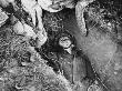Dead German Soldier In A Shallow Grave In Huppy, France, During World War Ii by Robert Hunt Limited Edition Print