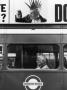 Juxtaposition Of Bus Passenger And Advertising Punk by Shirley Baker Limited Edition Print