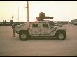 Us Army Apc On Flat-Bed Truck, At Port, Transported During Desert Shield Gulf Crisis Operation by Gil High Limited Edition Print