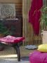 Ethnic Patio With Cushioned Stool And Bamboo Screen by Richard Powers Limited Edition Print