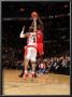 Philadelphia 76Ers V Toronto Raptors: Jrue Holiday And Jerryd Bayless by Ron Turenne Limited Edition Print