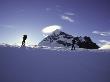 Climber Silhouettes In Front Of Mt. Aspiring, New Zealand by Michael Brown Limited Edition Pricing Art Print