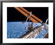 The Canadarm2 And Solar Array Panel Wings On The International Space Station, August 11, 2007 by Stocktrek Images Limited Edition Print