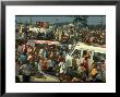 Crowd Of People, Some Sitting On Top Of Cars And Busses, During The Woodstock Music/Art Fair by John Dominis Limited Edition Print