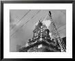 Fireman On Ladder Using A Hose To Extinguish Blazing Building Set Afire by Hans Wild Limited Edition Print