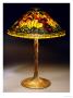 A Poppy Leaded Glass And Bronze Table Lamp by Tiffany Studios Limited Edition Print