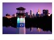 Boom Island Lighthouse With City Skyline Beyond At Dusk, Minneapolis, United States Of America by Richard Cummins Limited Edition Print