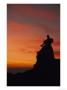 Walker Sat On Rock At Sunset, Peak District National Park, Uk by Mark Hamblin Limited Edition Pricing Art Print