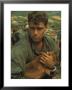 American Soldier Cradling Dog While Under Siege At Khe Sanh by Larry Burrows Limited Edition Print