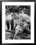 Woman Drinking From A Water Fountain by Yale Joel Limited Edition Print