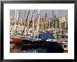Port Vell (Old Port) And Old City Behind, Barcelona, Catalonia, Spain by Charles Bowman Limited Edition Print