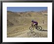 Side View Of Competitior In The Mount Sodom International Mountain Bike Race, Dead Sea Area, Israel by Eitan Simanor Limited Edition Print