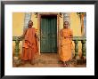 Young Buddhist Novices Relax Outside Their Temple In Sen Monorom, Cambodia, Southeast Asia by Andrew Mcconnell Limited Edition Print
