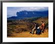 Hikers Taking Break On Hike To Top Of Roraima, In Background, Roraima, Bolivar, Venezuela by Krzysztof Dydynski Limited Edition Print