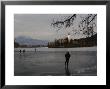 Hockey Players Brave The Cold And The Thin Ice For An Afternoon Game, Bled, Slovenia by Melissa Farlow Limited Edition Print