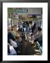 Passengers, Interior A Public Tram, Nagasaki, Island Of Kyushu, Japan by Christopher Rennie Limited Edition Print