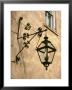 Iron Street Lamp Hangs From A Historic Building by Rex Stucky Limited Edition Print