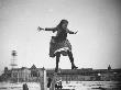 Young Edith Poey Jumping Off A Wooden Pole Onto The Sand At Coney Island by Wallace G. Levison Limited Edition Pricing Art Print