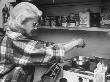 Jane Mansfield Cracking An Egg Over A Frying Pan On Electric Hot Plate In Her Home by Peter Stackpole Limited Edition Pricing Art Print
